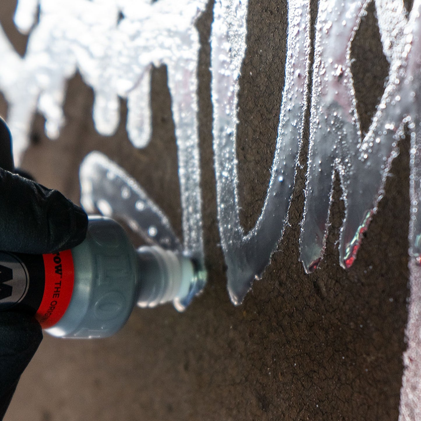 Molotow Burner Dripstick being used on wall.