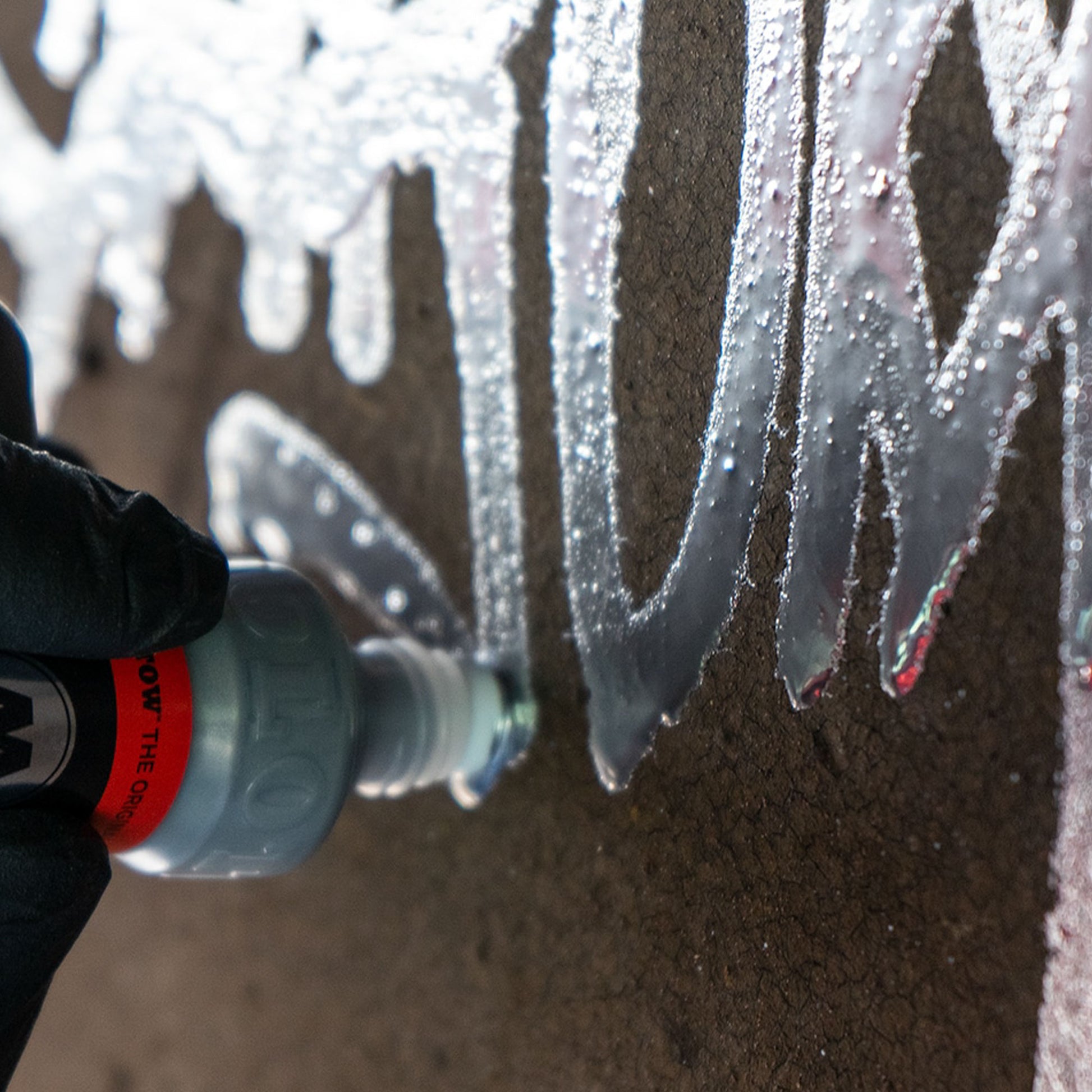 Molotow Burner Dripstick being used on wall.