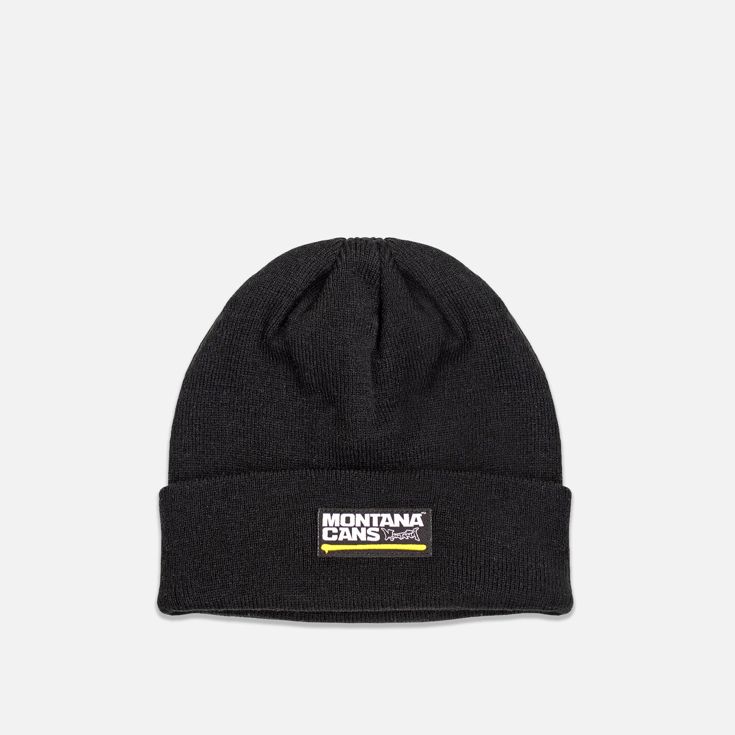 Black beanie with Montana Cans logo on a light gray background