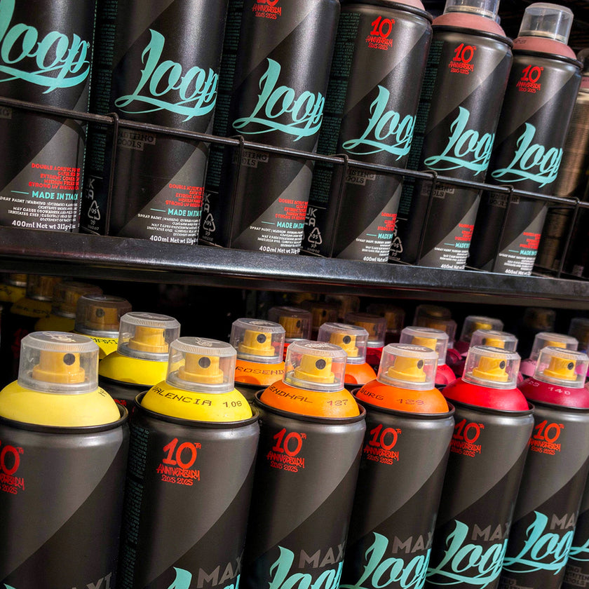 colourful spray paint cans for graffiti, street art and diy projects on retail shelf 