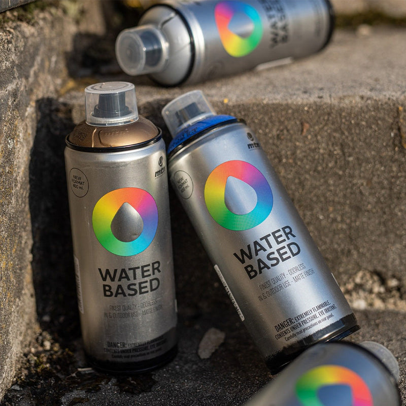 MTN water based cans resting on a step