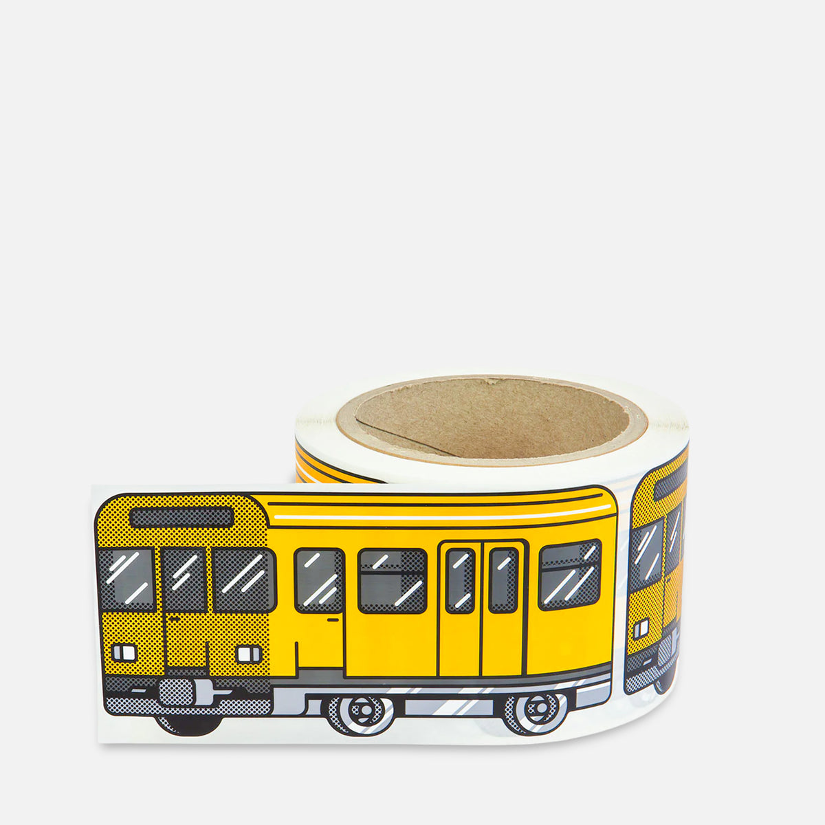 Roll of stickers with a yellow train BerlinMetro design on a grey background