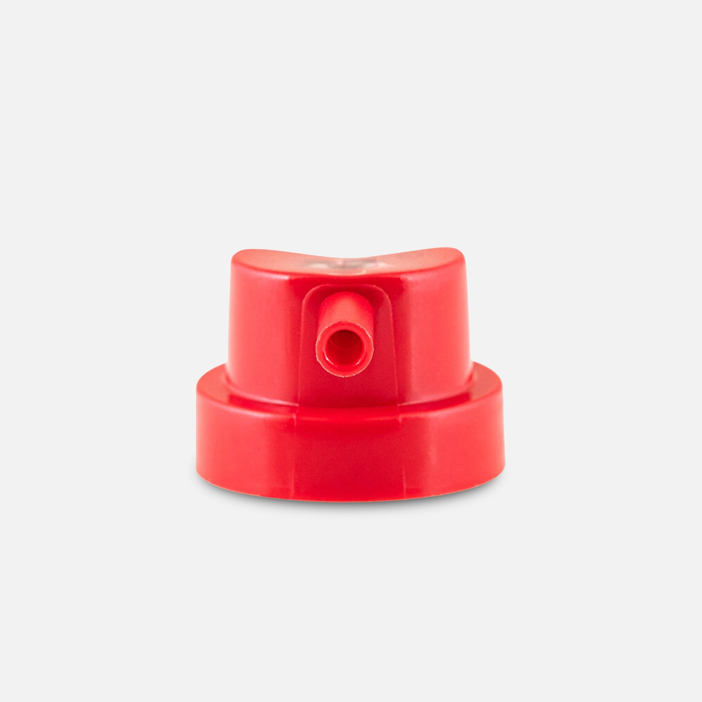 Red plastic cap on a light gray background