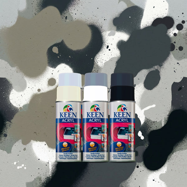 6 Keen spray paint cans on a camouflage background perfect for creating camo 