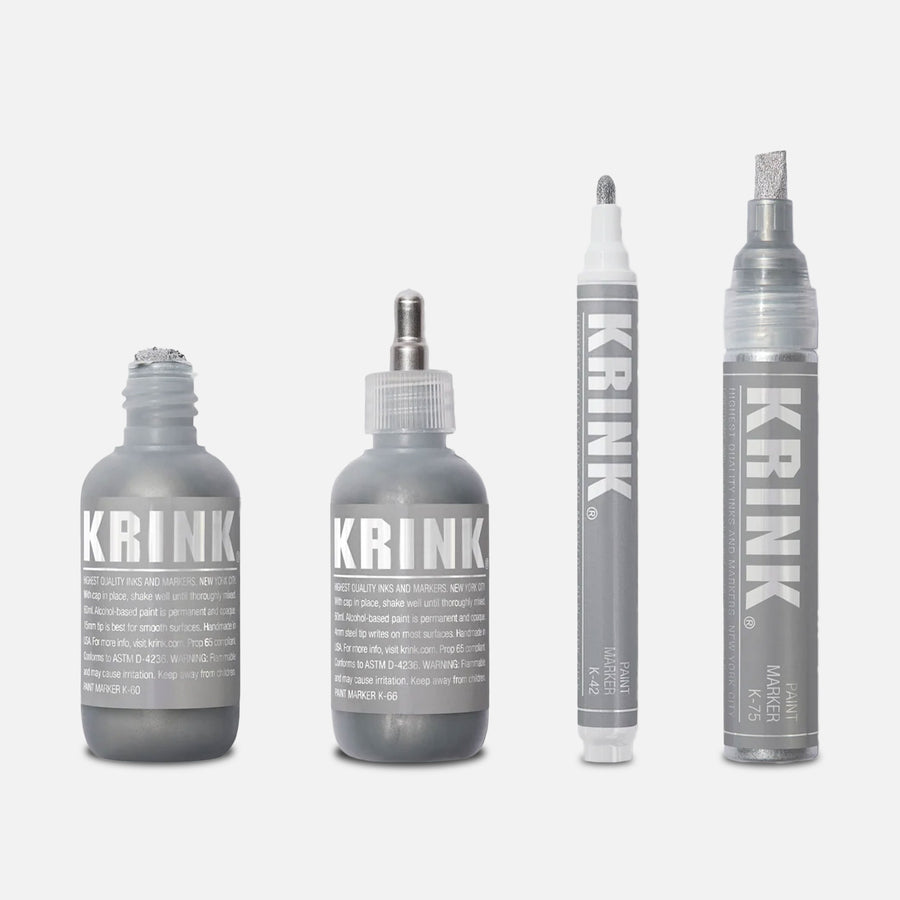Krink Super Silver set on a grey background.
