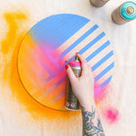 Montana Gold being used to spray on a stencil