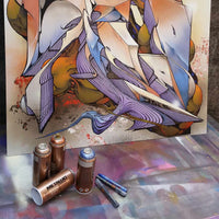 Montana Gold cans with Montana pens and a canvas