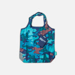 Camouflage-patterned reusable shopping bag with a visible brand logo on a light gray background