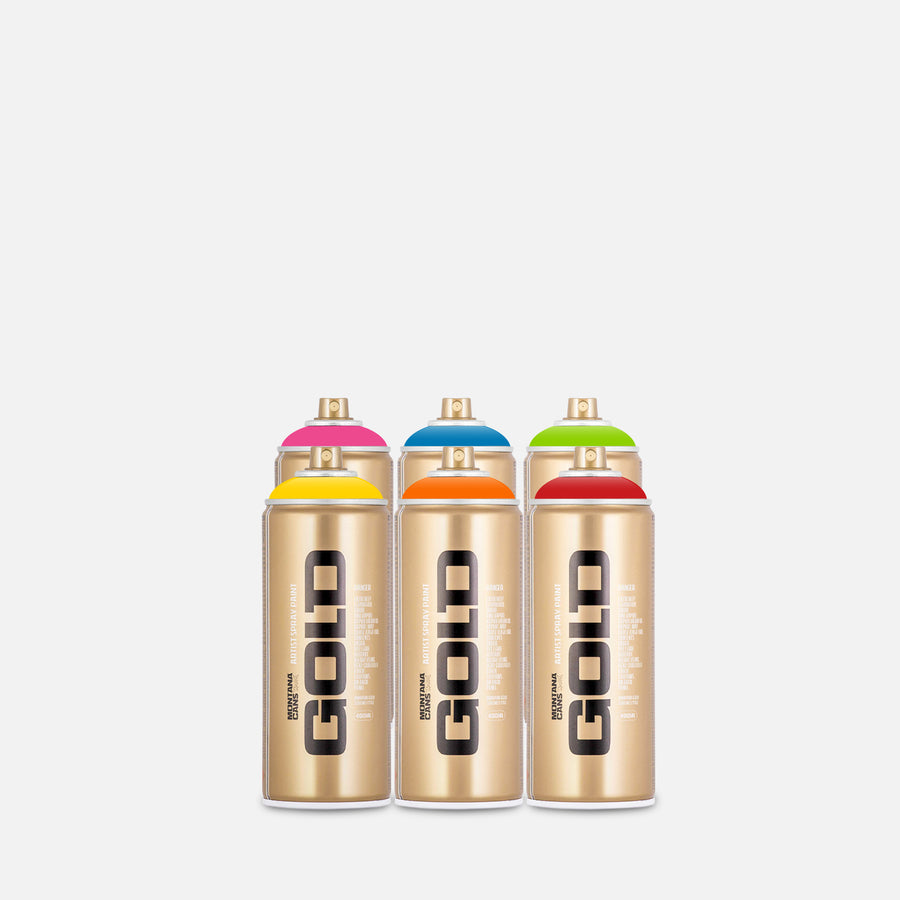 Montana gold spray paint 400ml 6 can pack of assorted colours on grey background 