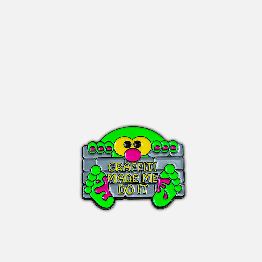 Colorful cartoon character with text 'Graffiti Made Me Do It' on a grey background