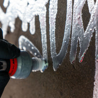 Molotow Burner Dripstick being used on wall.