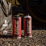 MTN Vice cans in black and white on the ground.