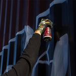 MTN Vice spray paint being sprayed on a container shipment.